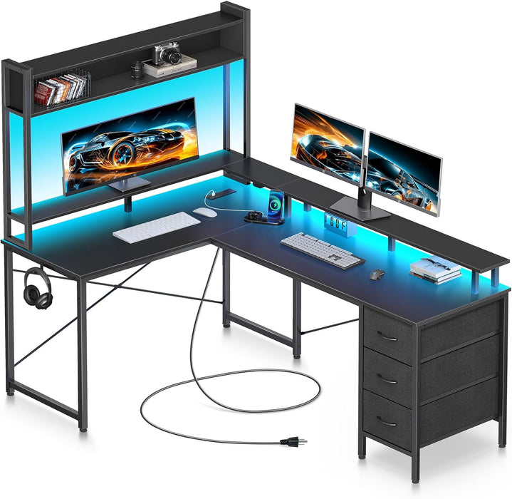 Seventable L Shaped Gaming Desk with Drawers, Reversible Computer Desk with LED Lights & Power Outlet, Home Office Desk with Monitor Stand, Hook, Corner Desk with Storage Shelves, Black